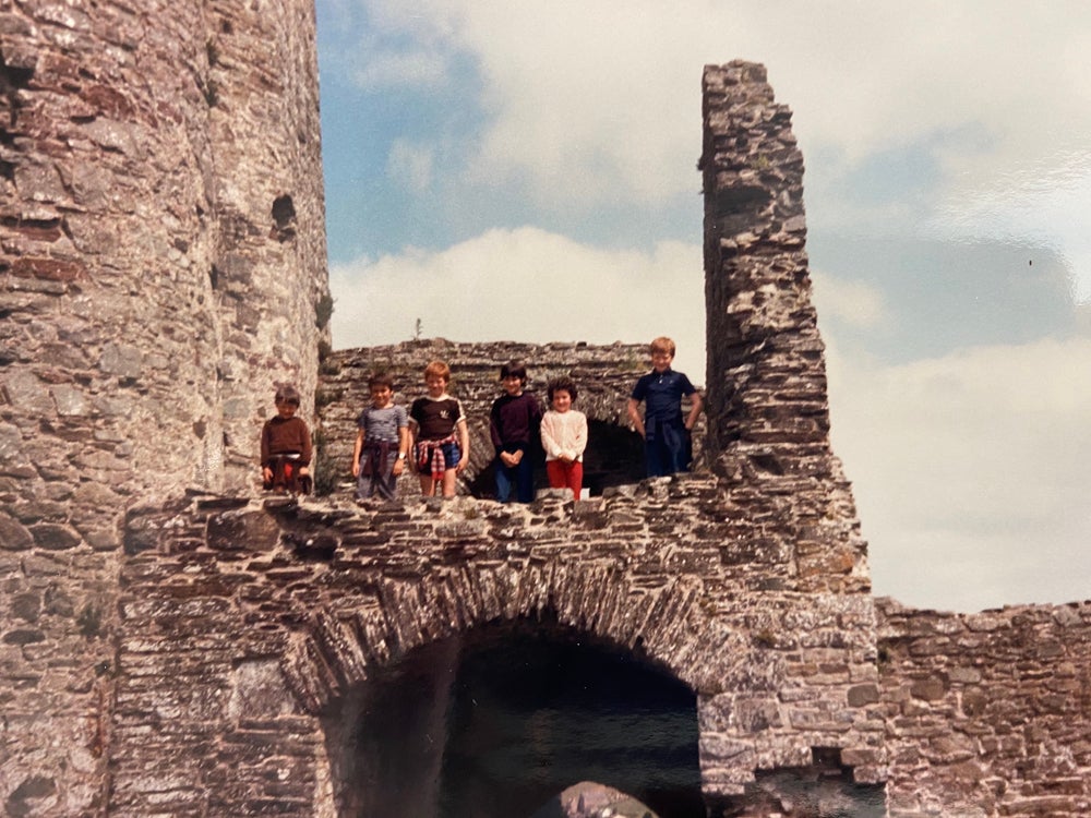 Marian in the red trousers, as a child at the castle (Collect/ PA Real Life)