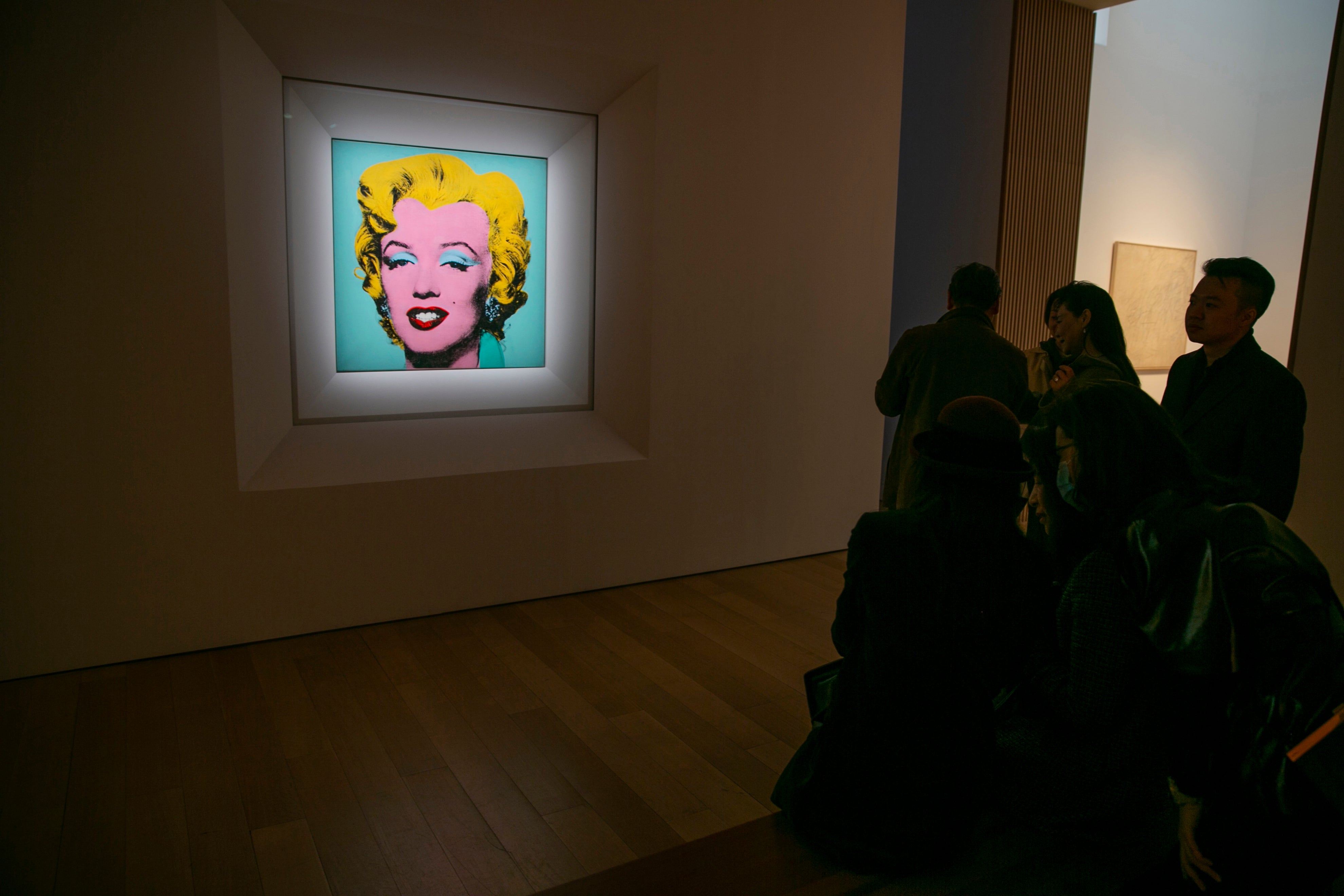 Warhol’s portrait is also the most expensive piece from the 20th century ever to be sold at auction, according to Christie’s auction house (Ted Shaffrey/AP)