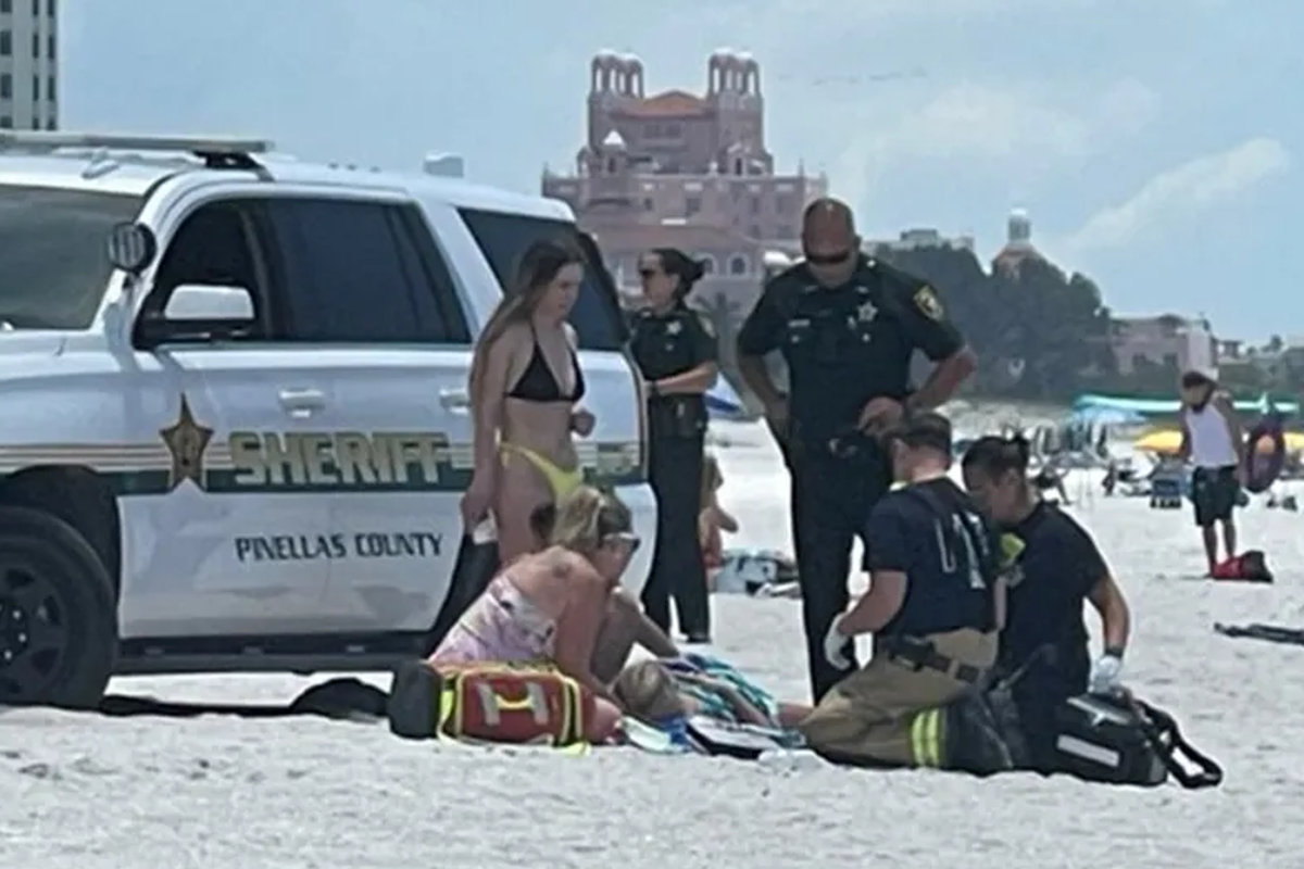 Sunbather run over by local cop as she lay on towel at beach | The ...