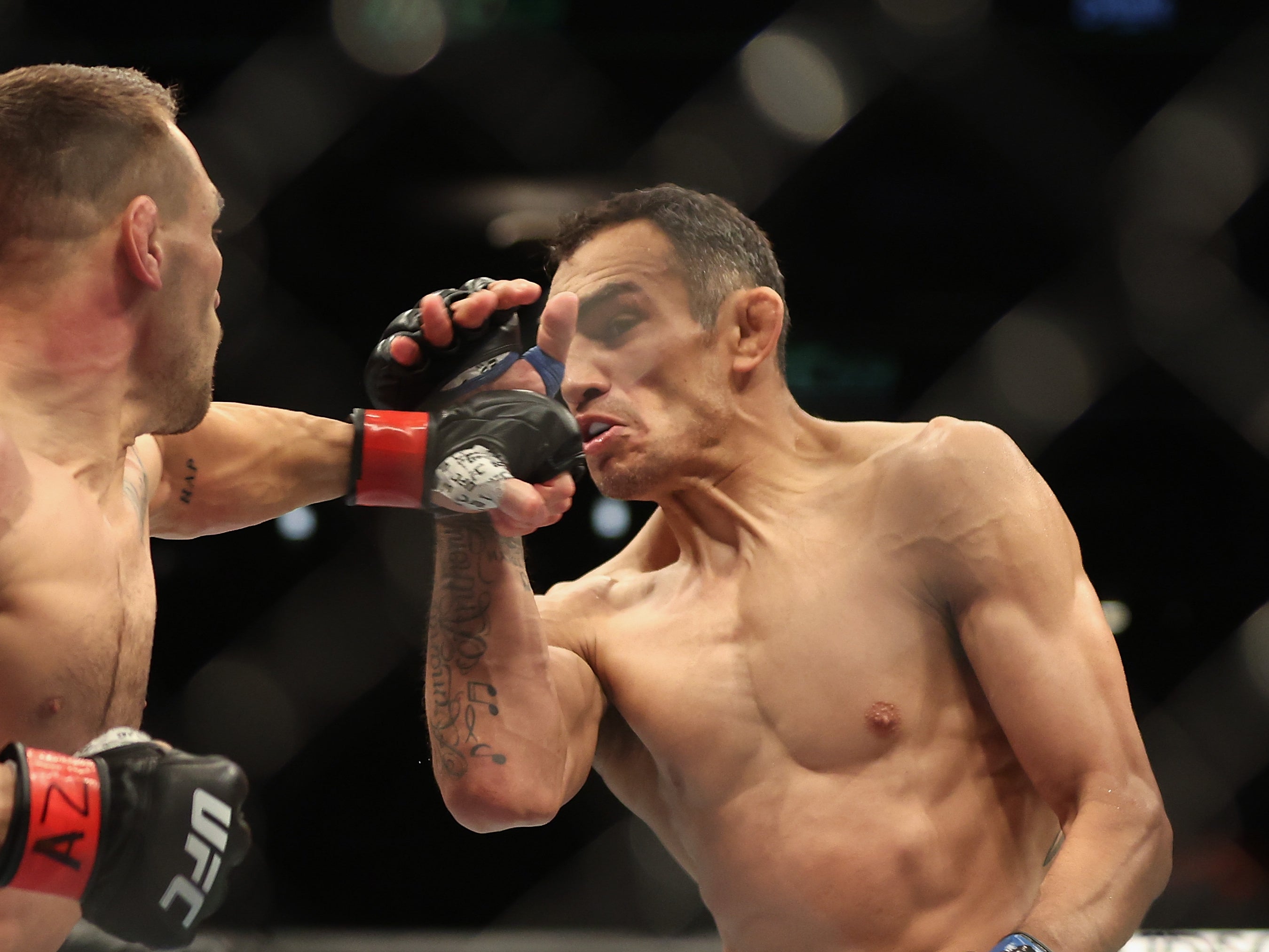 Tony Ferguson (right) during his loss to Michael Chandler at UFC 274