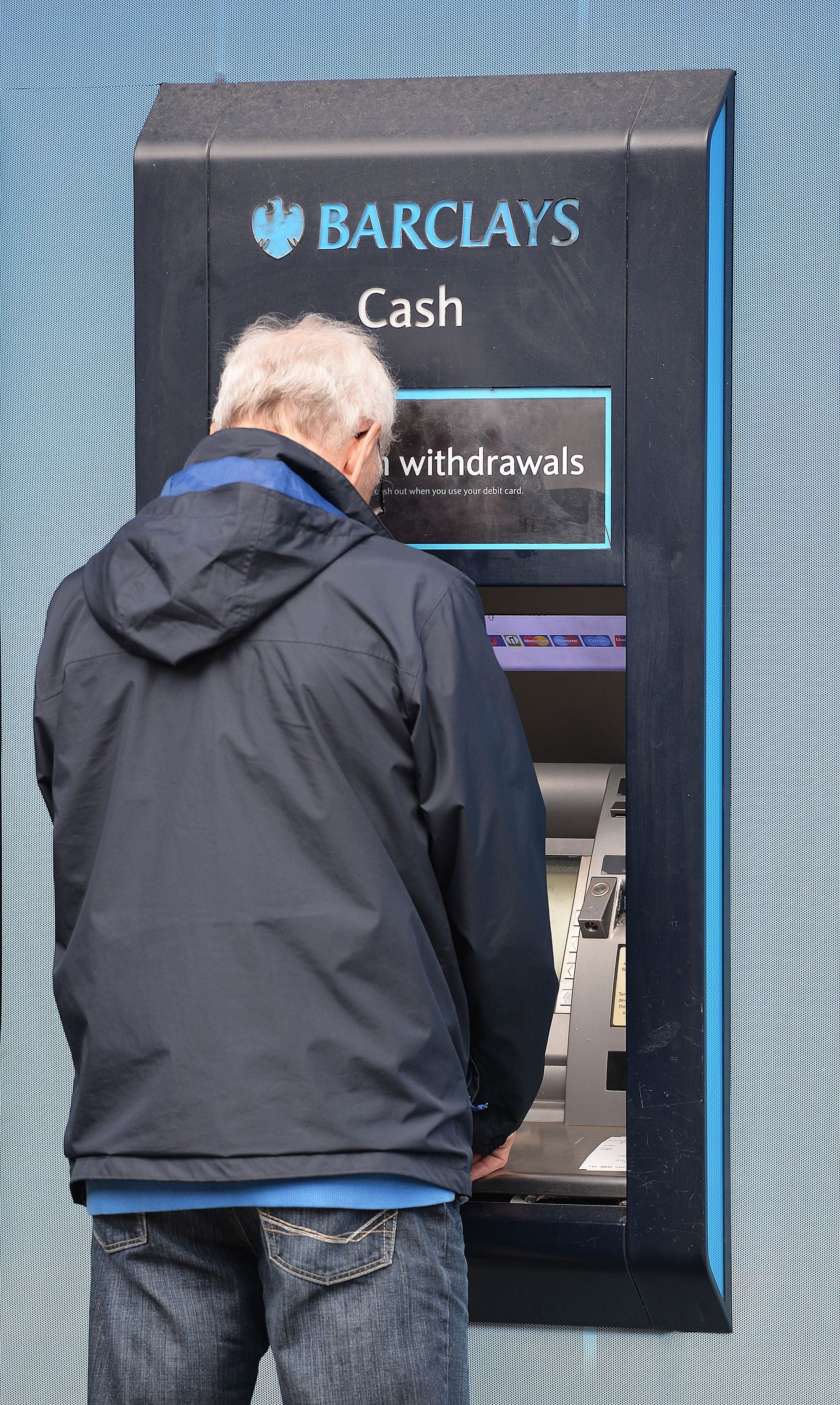 People will continue be able to access their own cash with ease, under measures promised in the Financial Services and Markets Bill (John Stillwell/PA)
