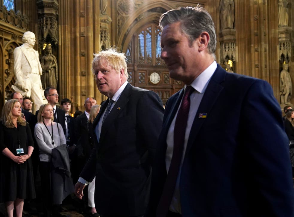 Prime Minister Boris Johnson (left) and Keir Starmer walk through the Central Lobby (Yui Mok/PA)