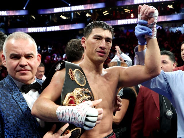 <p>Dmitry Bivol celebrates defeating Canelo Alvarez </p>