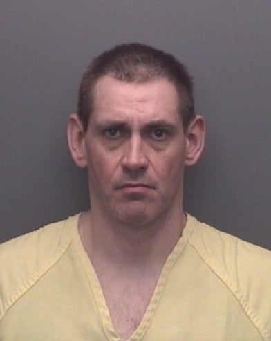 Casey White pictured in his new mugshot after being returned to jail following a 10-day manhunt