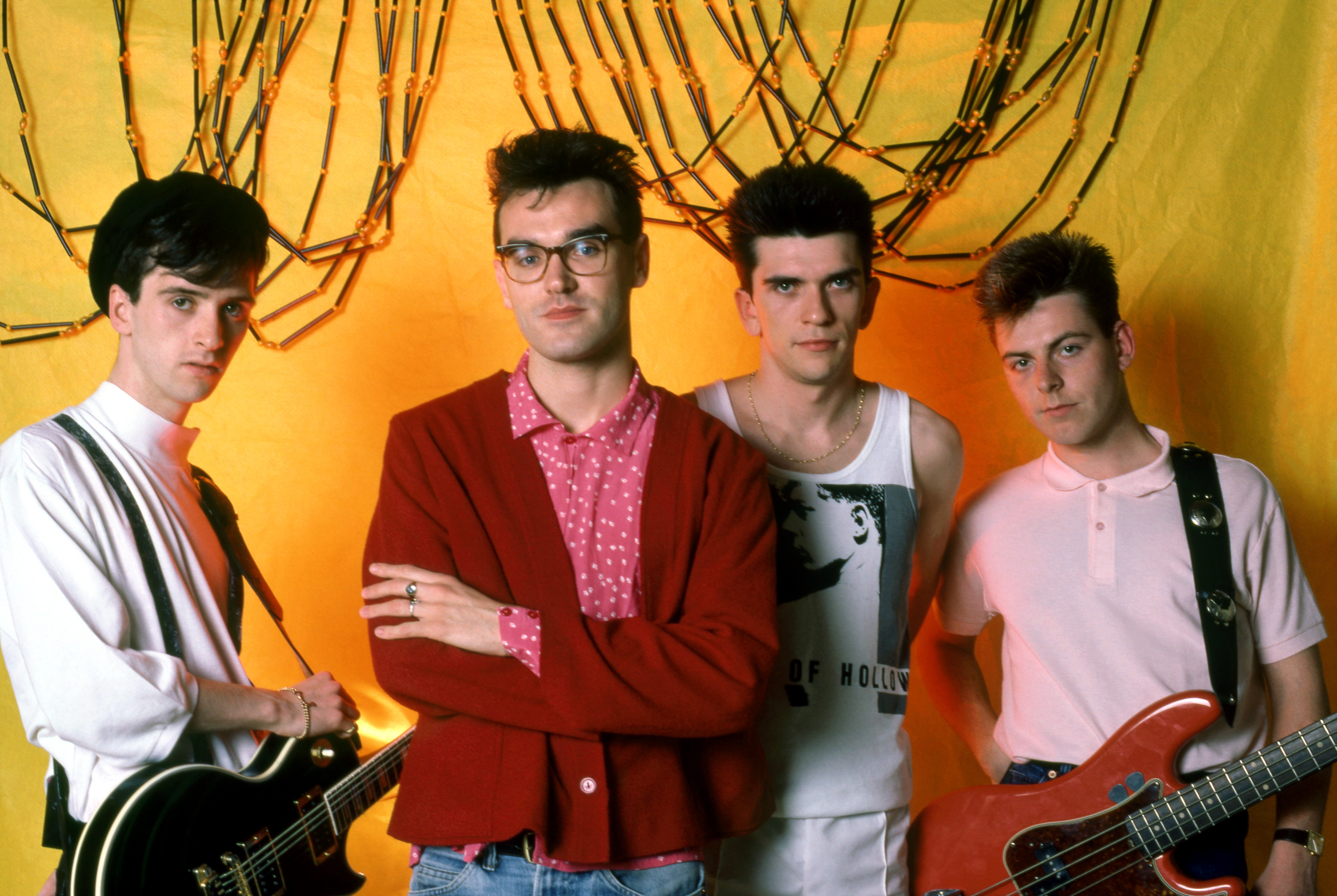 Marr, Morrissey, Mike Joyce and Andy Rourke pose for a portrait during the 1985 Meat Is Murder Tour