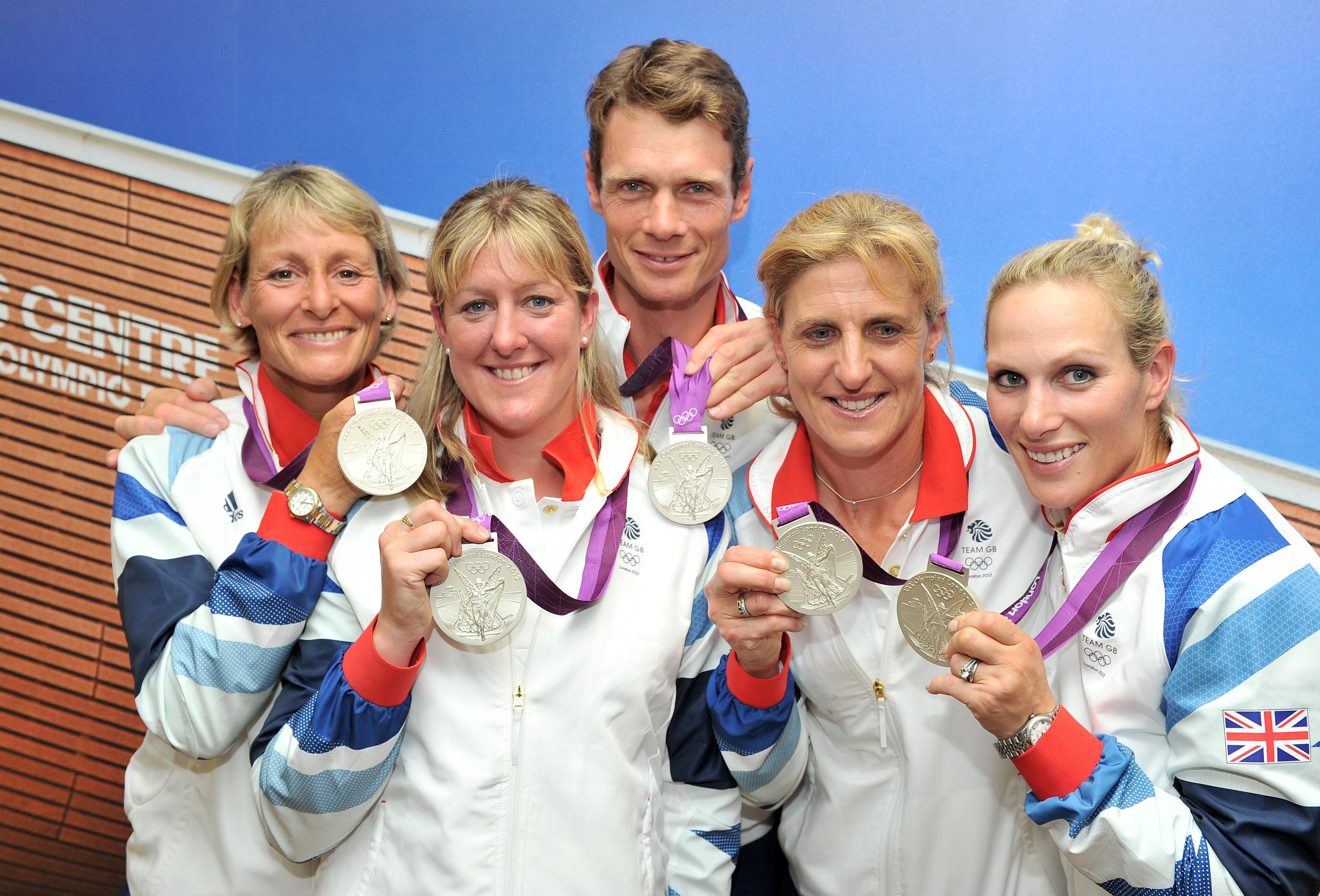 Nicola Wilson (second left) with her fellow Great Britain team silver medallists at the London Olympics (Martin Rickett/PA)