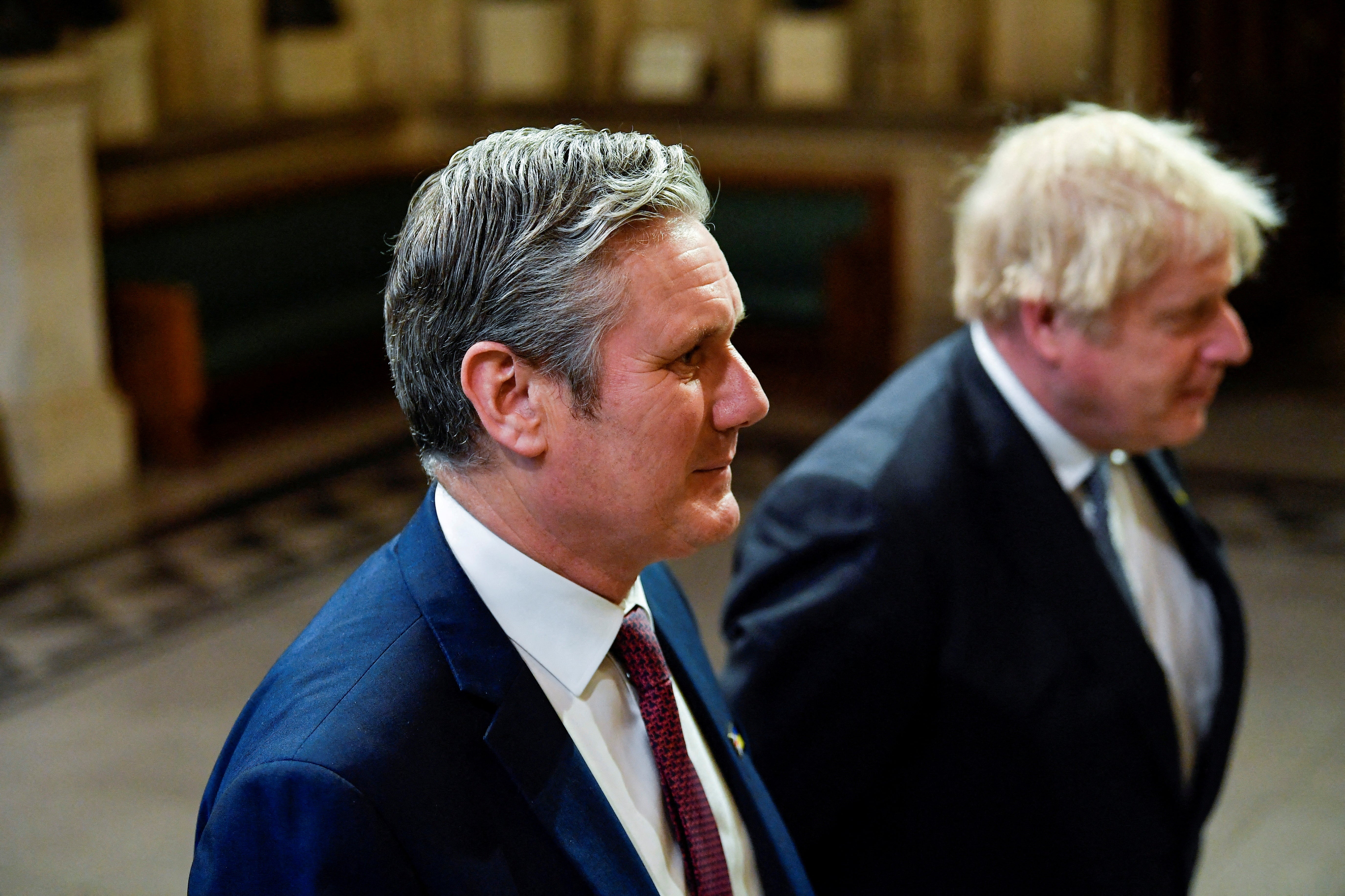 The Labour leader pretended to laugh in an easygoing way while he and Boris Johnson walked side by side to the House of Lords