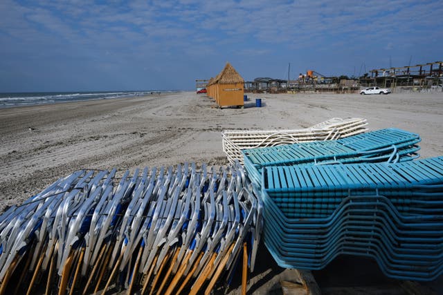 <p>Beach chairs sit piled in the sand in the shore community of Wildwood on May 28, 2021 in Wildwood, New Jersey.   (Photo by Spencer Platt/Getty Images)</p>