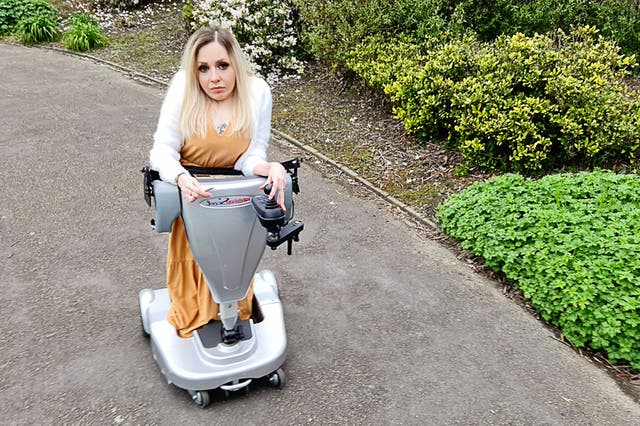 Joanna Klich, 32, has not been able to sit down since she was a toddler – only ever standing or lying down (Collect/PA Real Life)