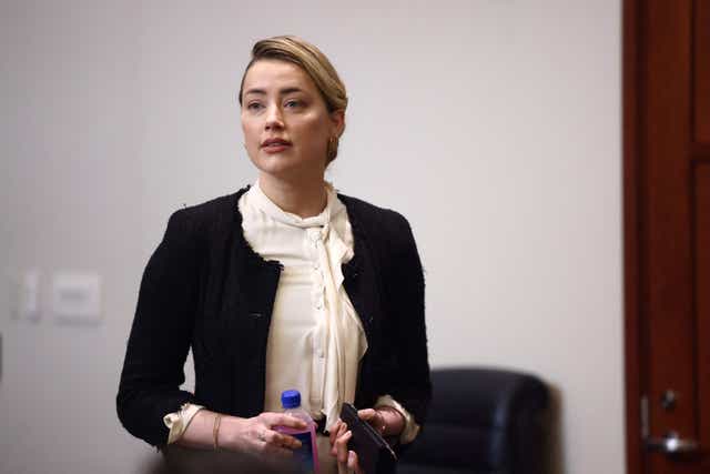 <p>Amber Heard arrives at the Fairfax County Circuit Courthouse in  Virginia (Photo credit: AFP via Getty Images)</p>