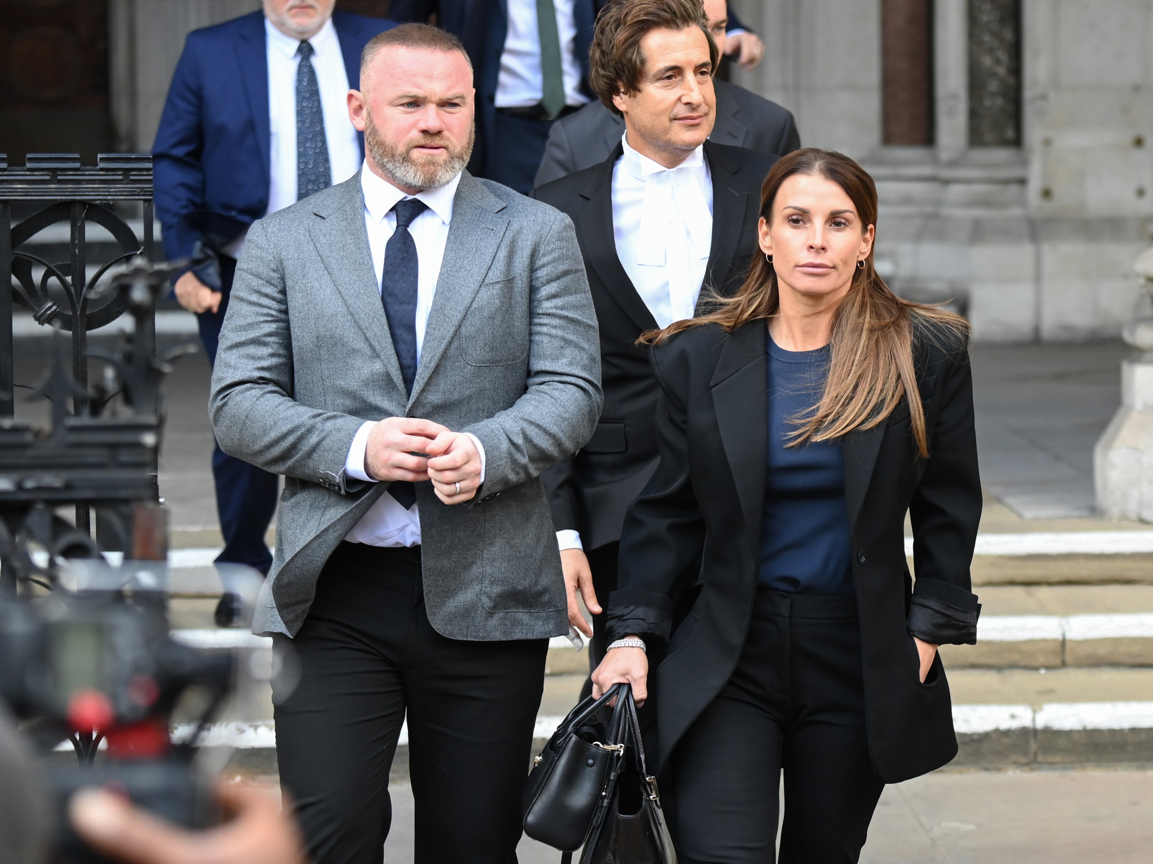 Wayne Rooney and Coleen Rooney depart the Royal Courts of Justice on Tuesday