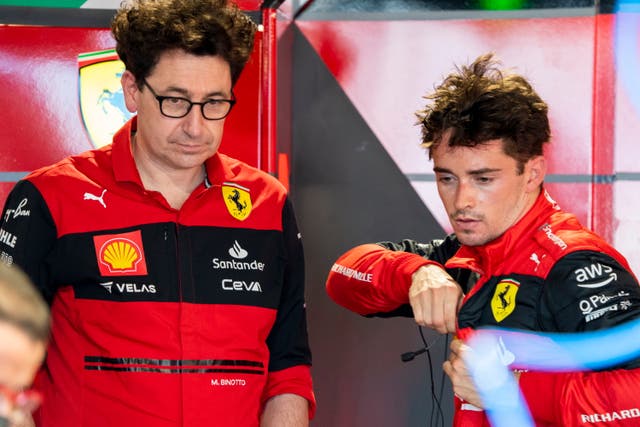 <p>Charles Leclerc of Scuderia Ferrari talks with team principal Mattia Binotto</p>