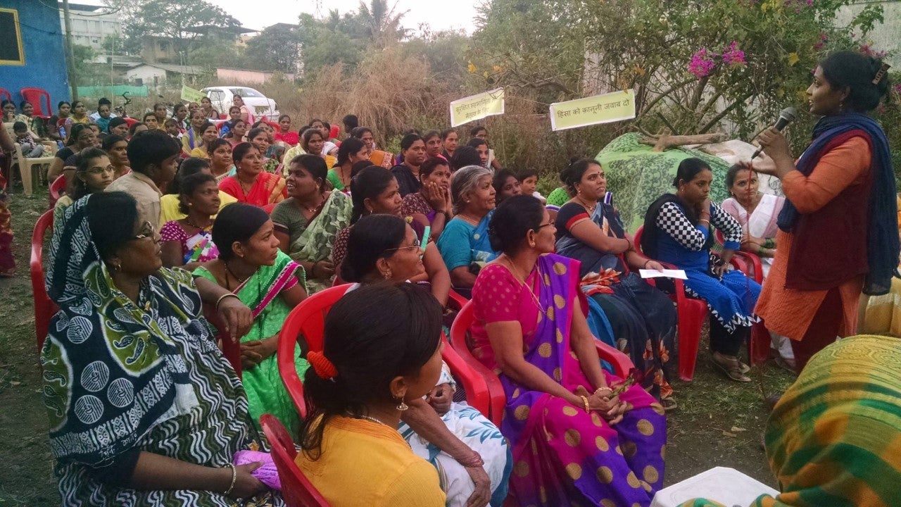 Deepa Pawar (far right), founding trustee of Anubhuthi – a female-led organisation working for equality, justice and democracy – speaks to women about safe working spaces, in Dombivli, a city near Mumbai