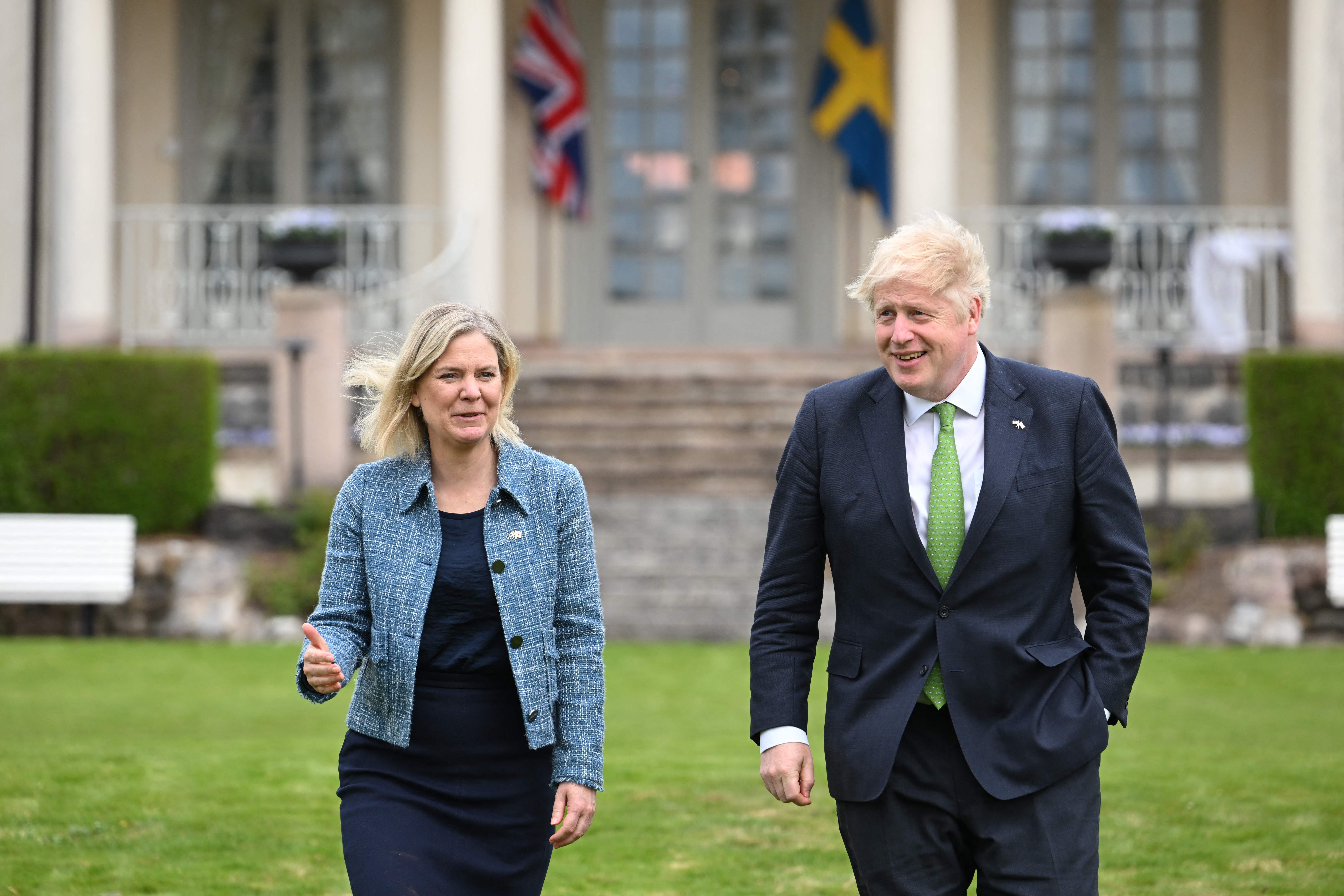 Boris Johnson and Sweden’s PM Magdalena Andersson take a walk after signing a declaration of political solidarity