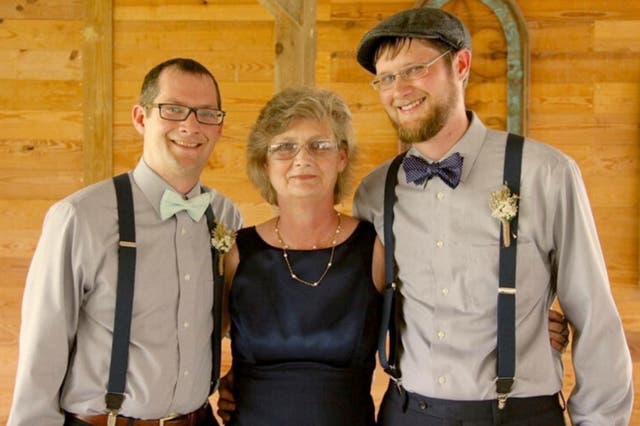 <p>Connie Ridgeway with her two sons</p>