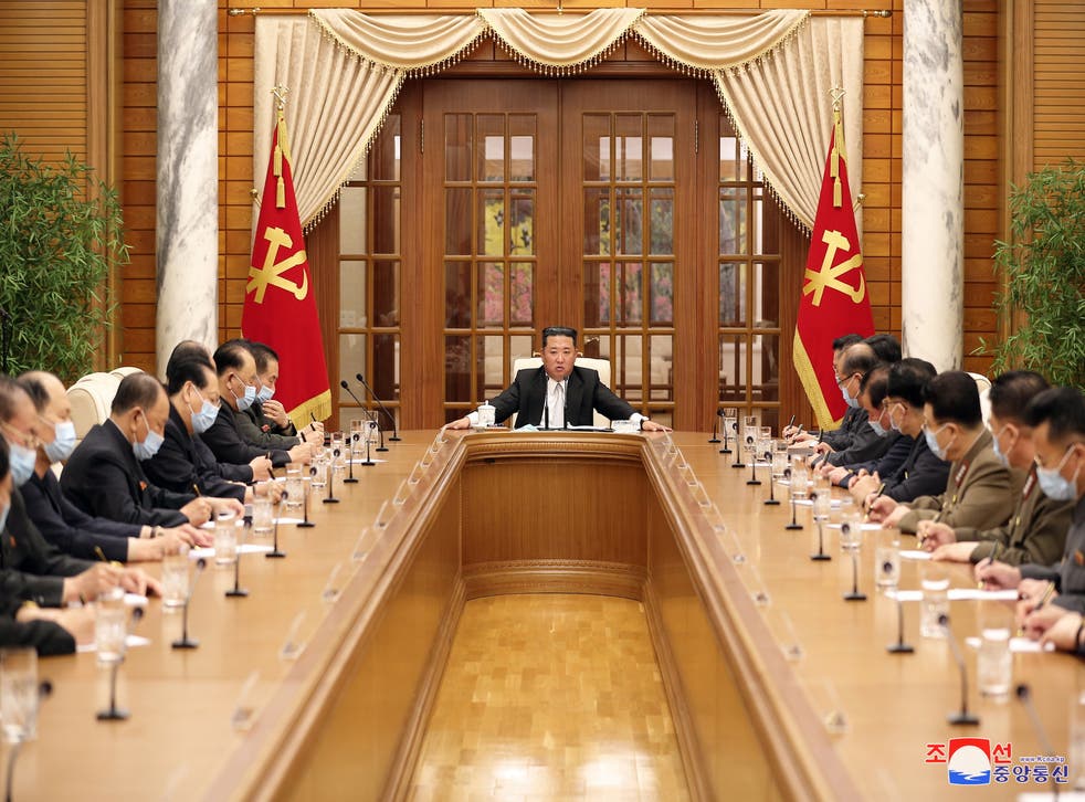 <p>Kim Jong-un chairs a meeting on 12 May to discuss the government’s response to a Covid-19 outbreak in Pyongyang</p>