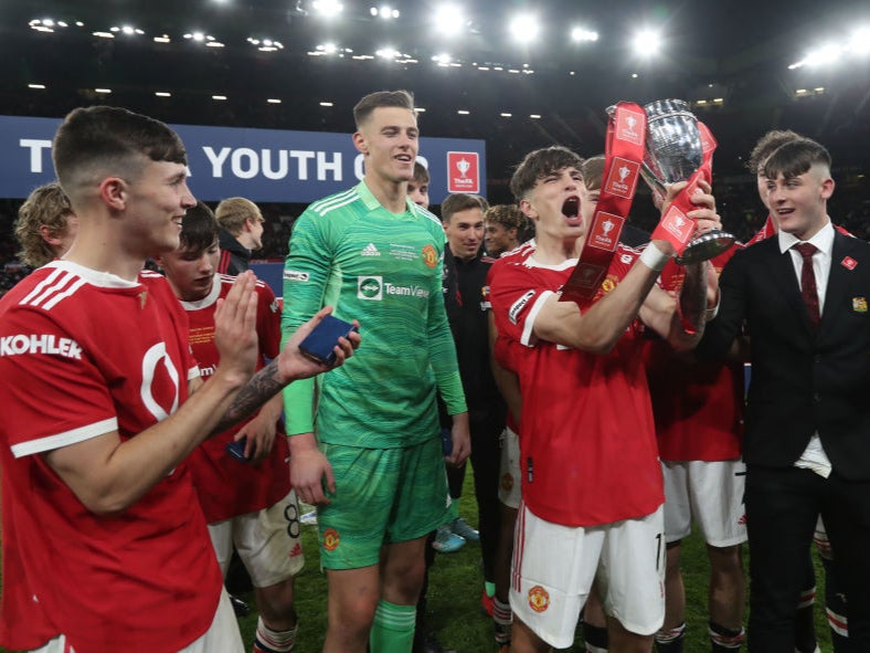 Alejandro Garnacho lifts the FA Youth Cup trophy after victory over Forest on Wednesday