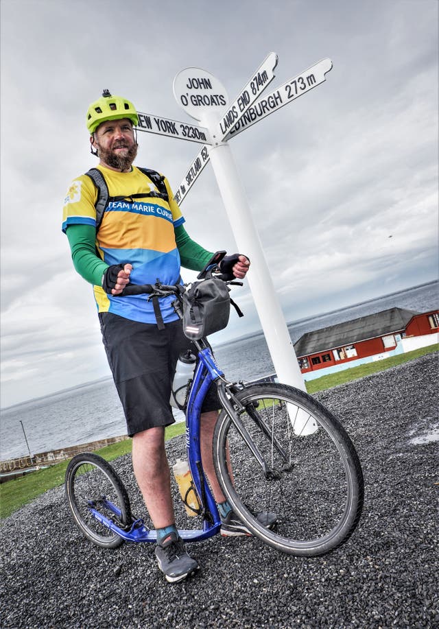 Stuart Jamieson made the journey from Land’s End to John O’Groats by scooter (Jim Stewart/Marie Curie/PA)