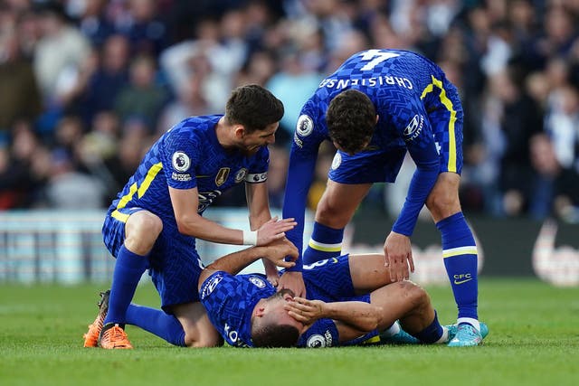 <p>Mateo Kovacic, centre, reacts after being injured by Dan James’ tackle in Wednesday’s Premier League clash with Leeds</p>