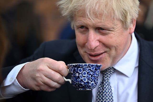 <p>Prime minister Boris Johnson talks to local business people after a regional cabinet meeting at Middleport Pottery in Stoke on Trent </p>
