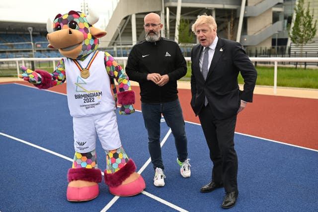 Prime Minister Boris Johnson with the Birmingham 2022 Commonwealth Games Mascot, Perry The Bull (Oli Scarff/PA)