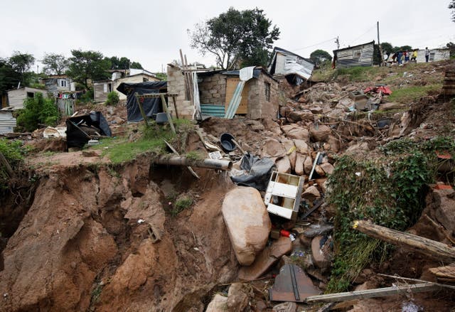 <p>Remains of a home where two children were killed in flooding in Lindelani, Durban, South Africa last month. Scientists found climate change made the disaster twice as likely to have happened</p>