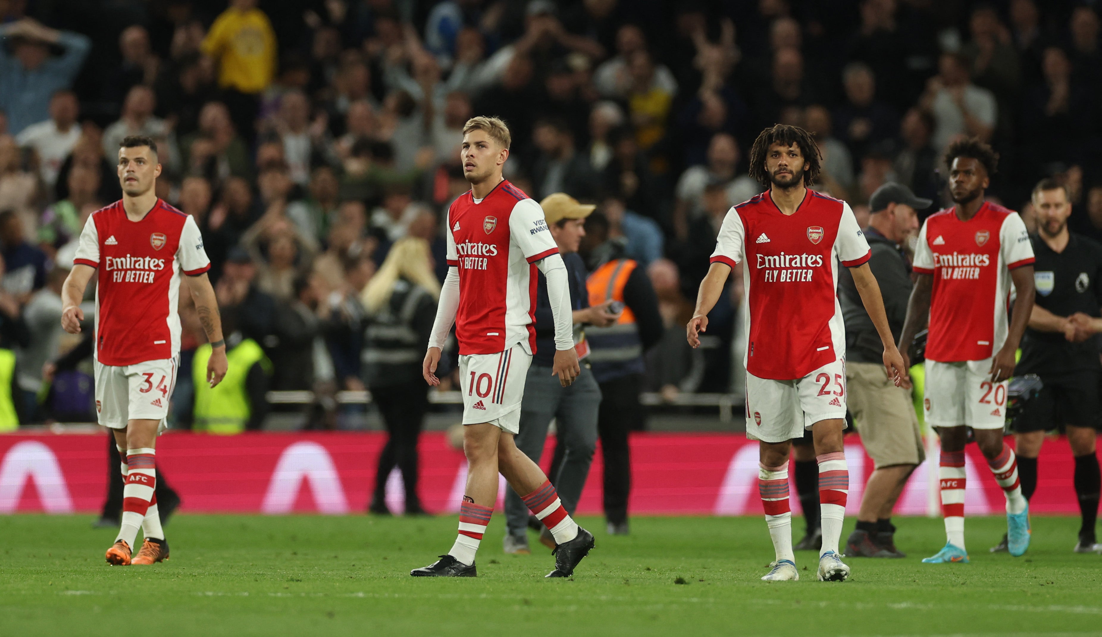 Arsenal's Emile Smith Rowe, Mohamed Elneny and Granit Xhaka look dejected