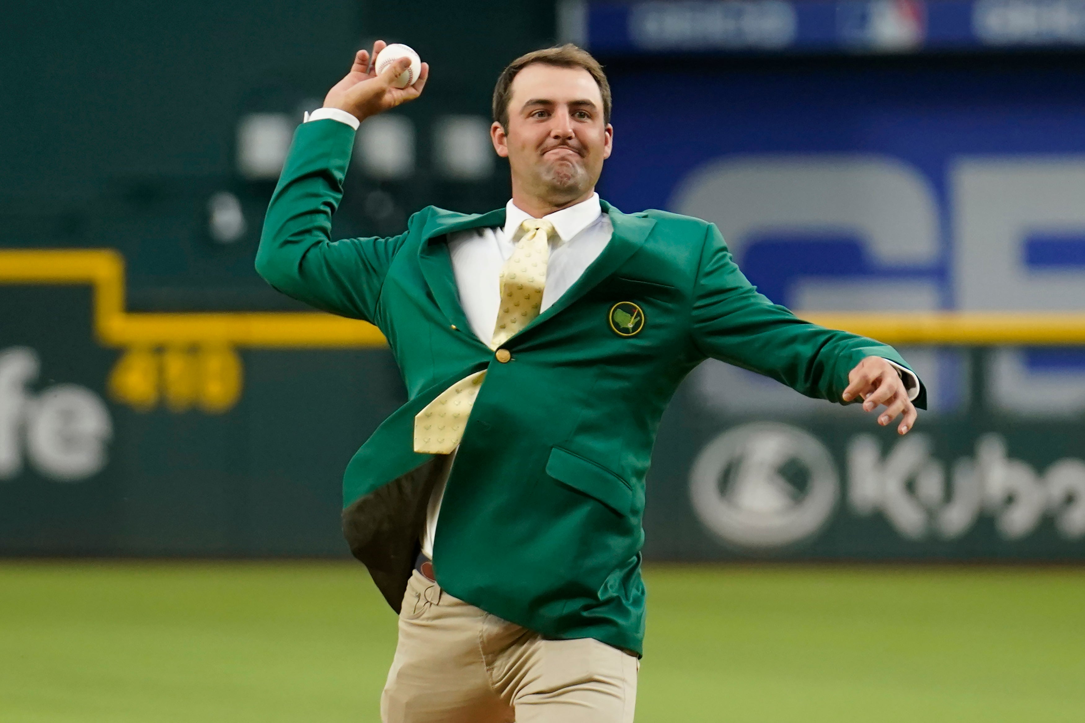 Masters champion Scottie Scheffler throws a ceremonial first pitch before the game between the Houston Astros and the Texas Rangers (Tony Gutierrez/AP)