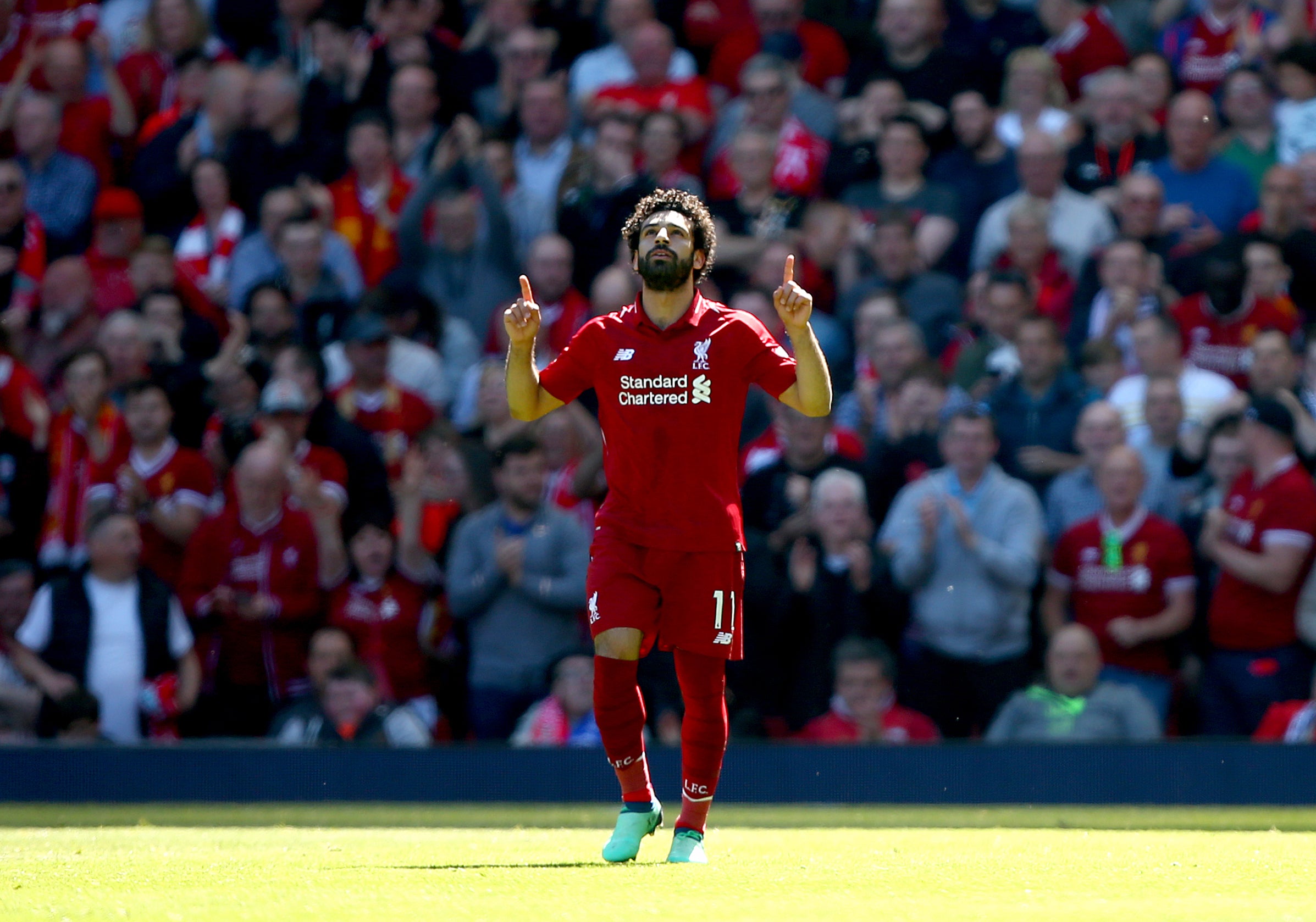 Liverpool’s Mohamed Salah celebrates scoring his 32nd Premier League goal of 2017-18, a new best haul by a player in a 38-match season (Dave Thompson/PA).