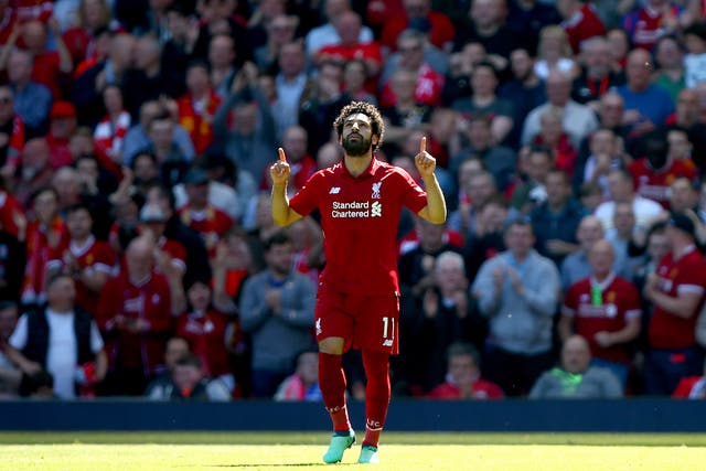 Liverpool’s Mohamed Salah celebrates scoring his 32nd Premier League goal of 2017-18, a new best haul by a player in a 38-match season (Dave Thompson/PA).