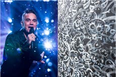 Robbie Williams says he is ‘not looking forward to being kicked in the head’ over his art