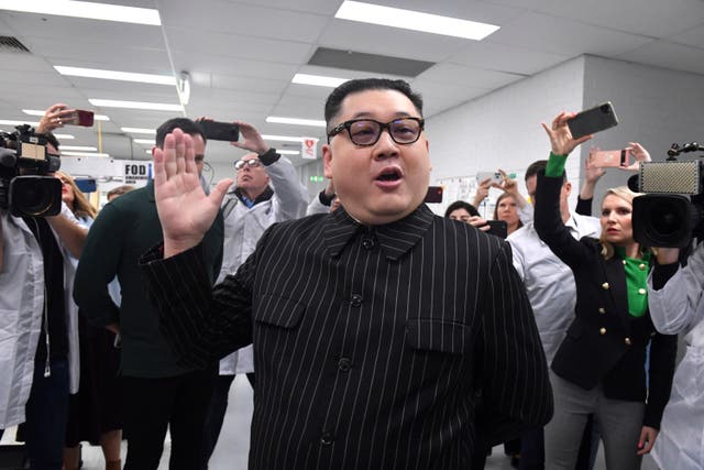 <p>A man impersonating North Korea's leader Kim Jong-un arrives at an election event that was attended by prime minister Scott Morrison</p>