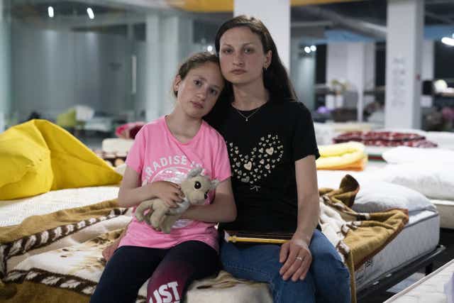 Ukrainian refugee Elena Boyko, 30, and her daughter Viktoria Boyko, (Kirsty O’Connor/PA)