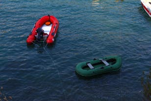 <p>Inflatable boats of the kind Mr Routledge says he’ll ‘paddle’ across the Channel</p>