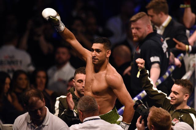 <p>Amir Khan after stopping Phil Lo Greco in April 2018</p>