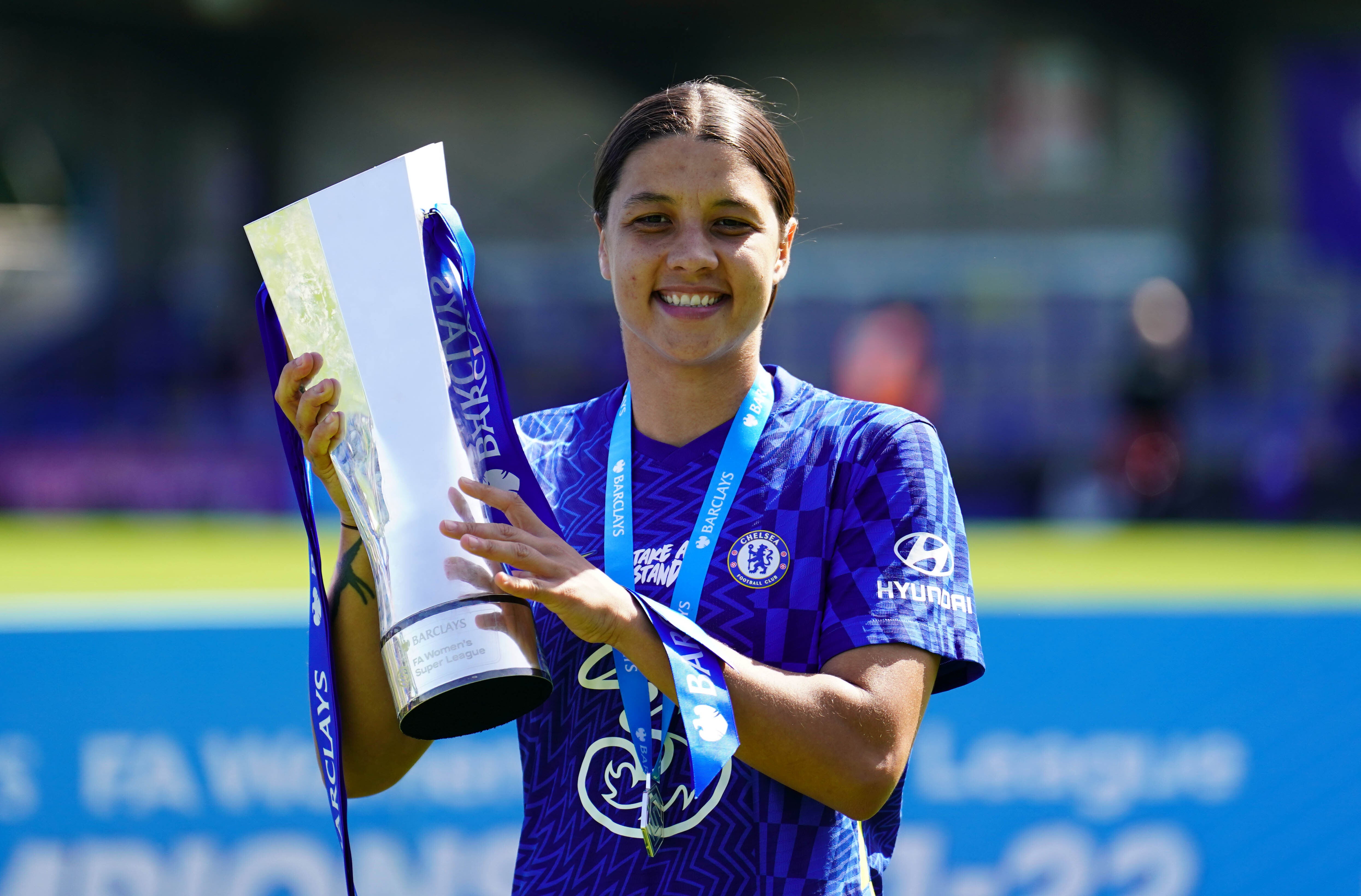 Sam Kerr with the trophy after helping Chelsea win the Women’s Super League last weekend (Adam Davy/PA).