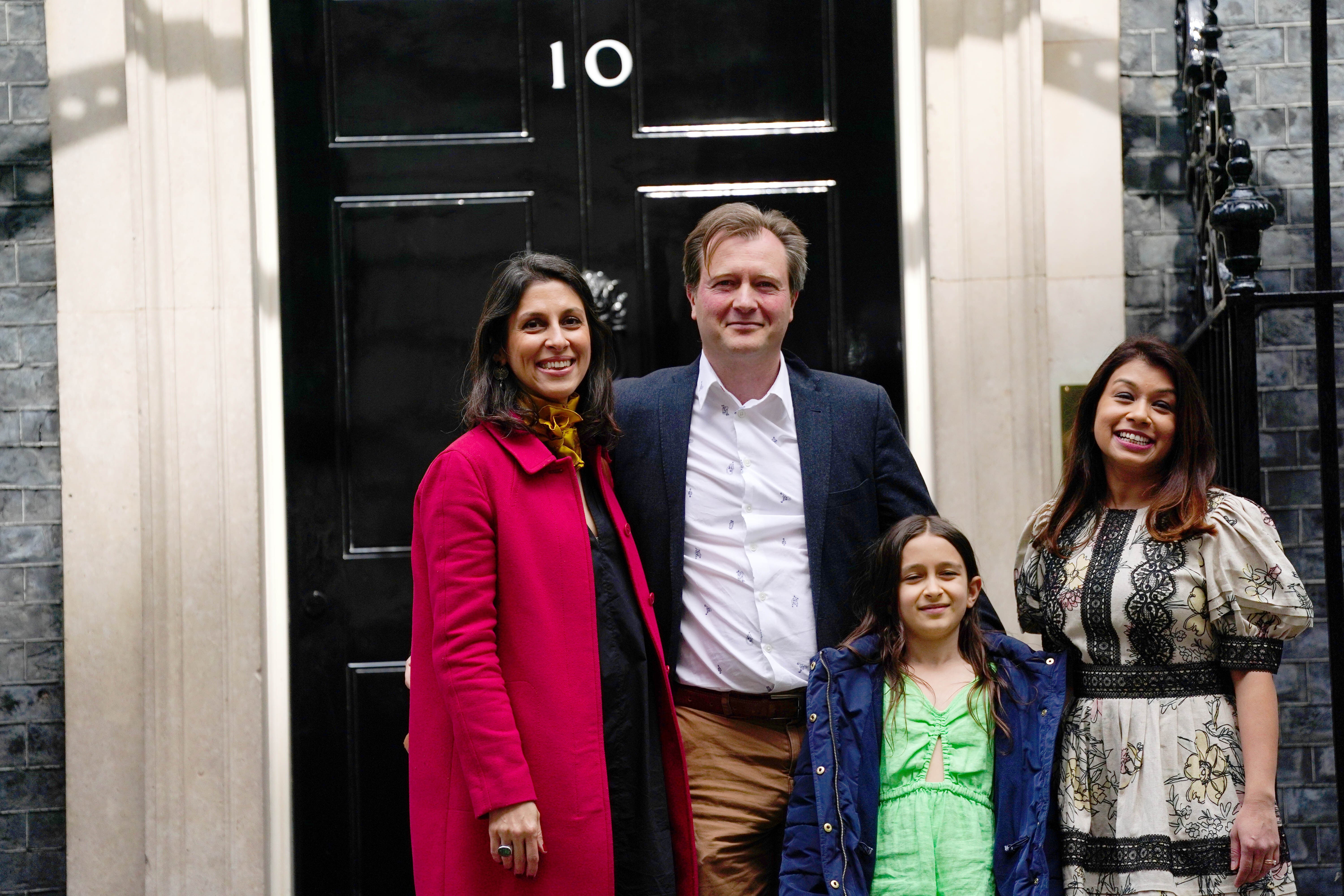 Nazanin Zaghari-Ratcliffe with her husband Richard Ratcliffe, daughter Gabriella and MP Tulip Siddiq arriving in Downing Street (Victoria Jones/PA)