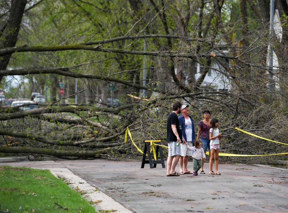 <p>Residents of Sioux Falls, SD survey damage after Thursday’s wind storm</p>