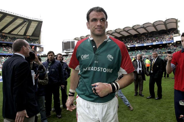 Leicester Tigers’ Martin Johnson walks from the pitch in dejection after their defeat (David Davies/PA)