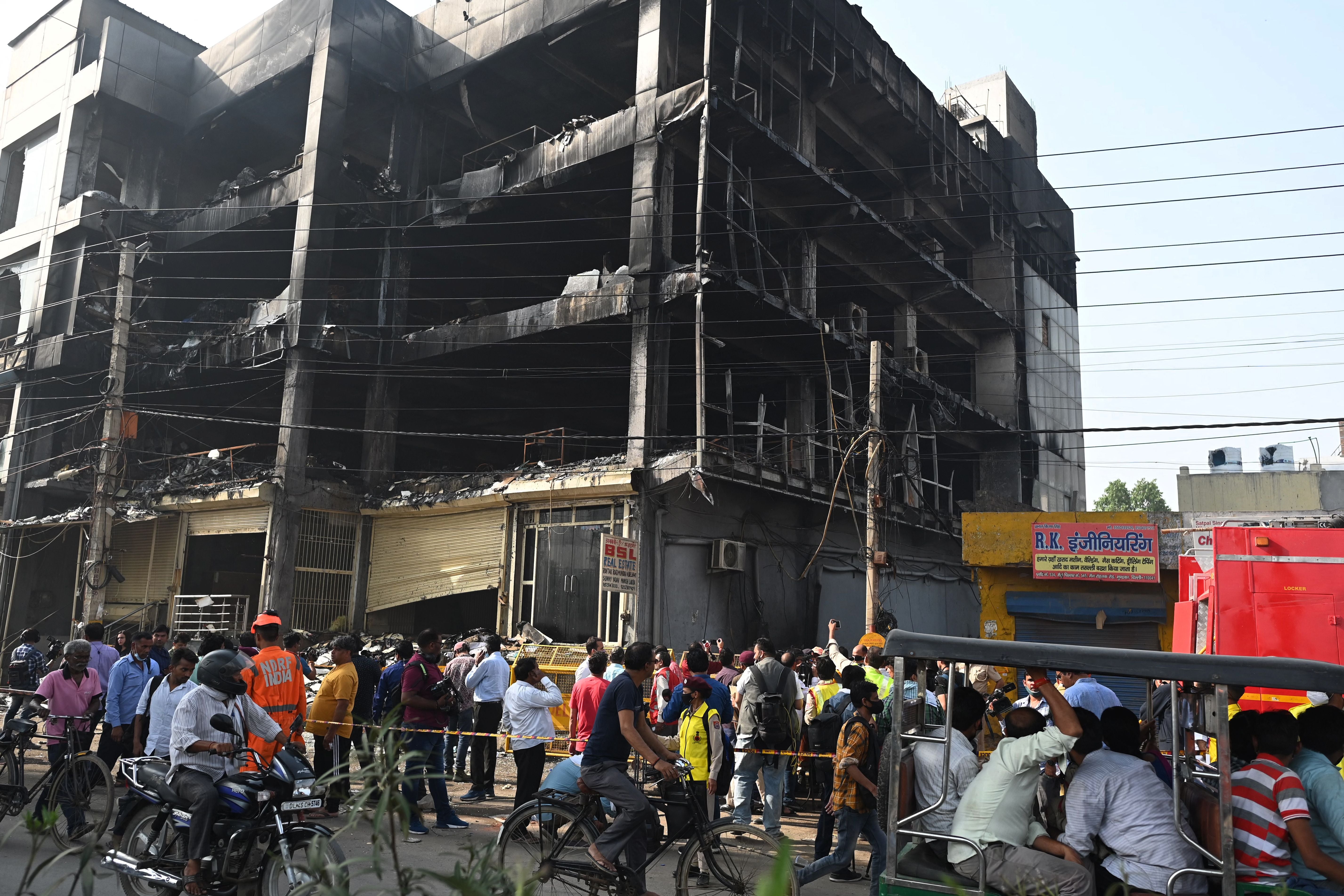 Dozens of people have been injured in a massive fire in a building in the Indian capital New Delhi on May 13, emergency services said