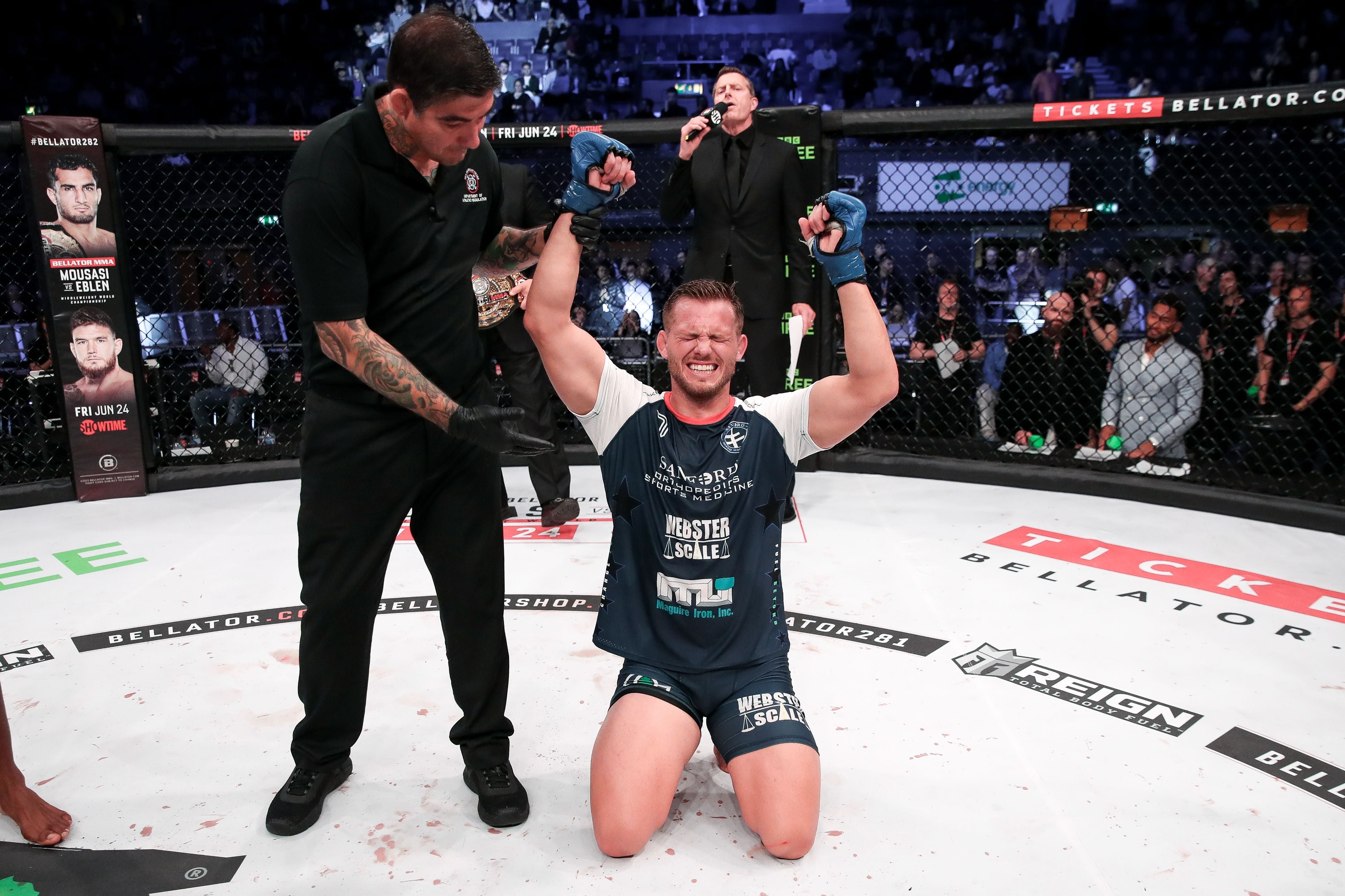 Storley celebrates his split-decision victory over Page in London