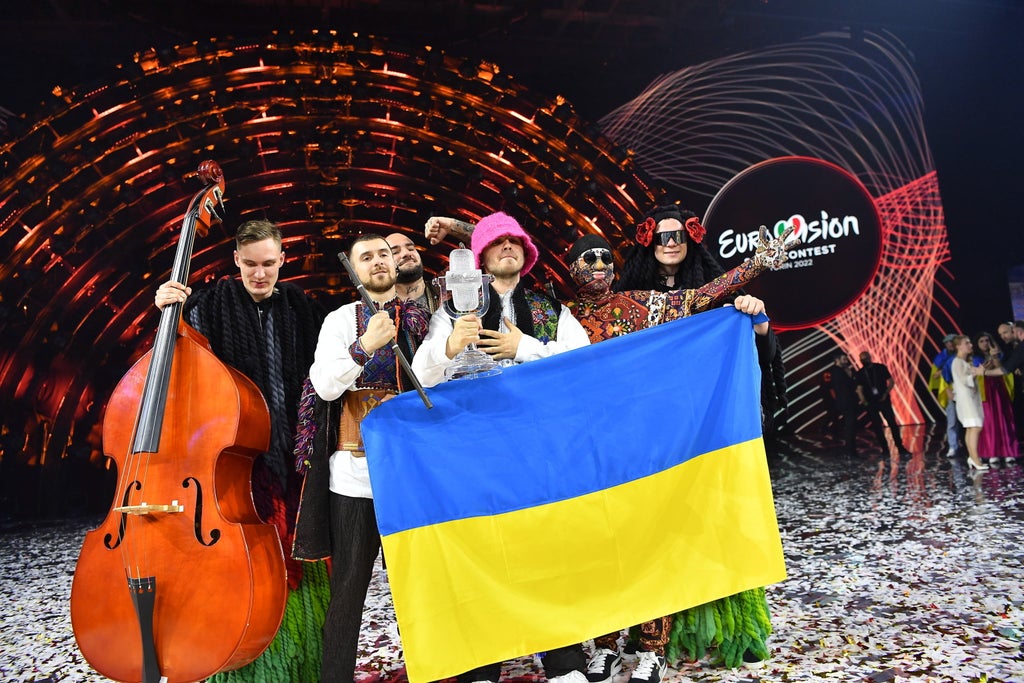‘This victory is for every Ukrainian’: Kalush Orchestra accept Eurovision winner’s trophy