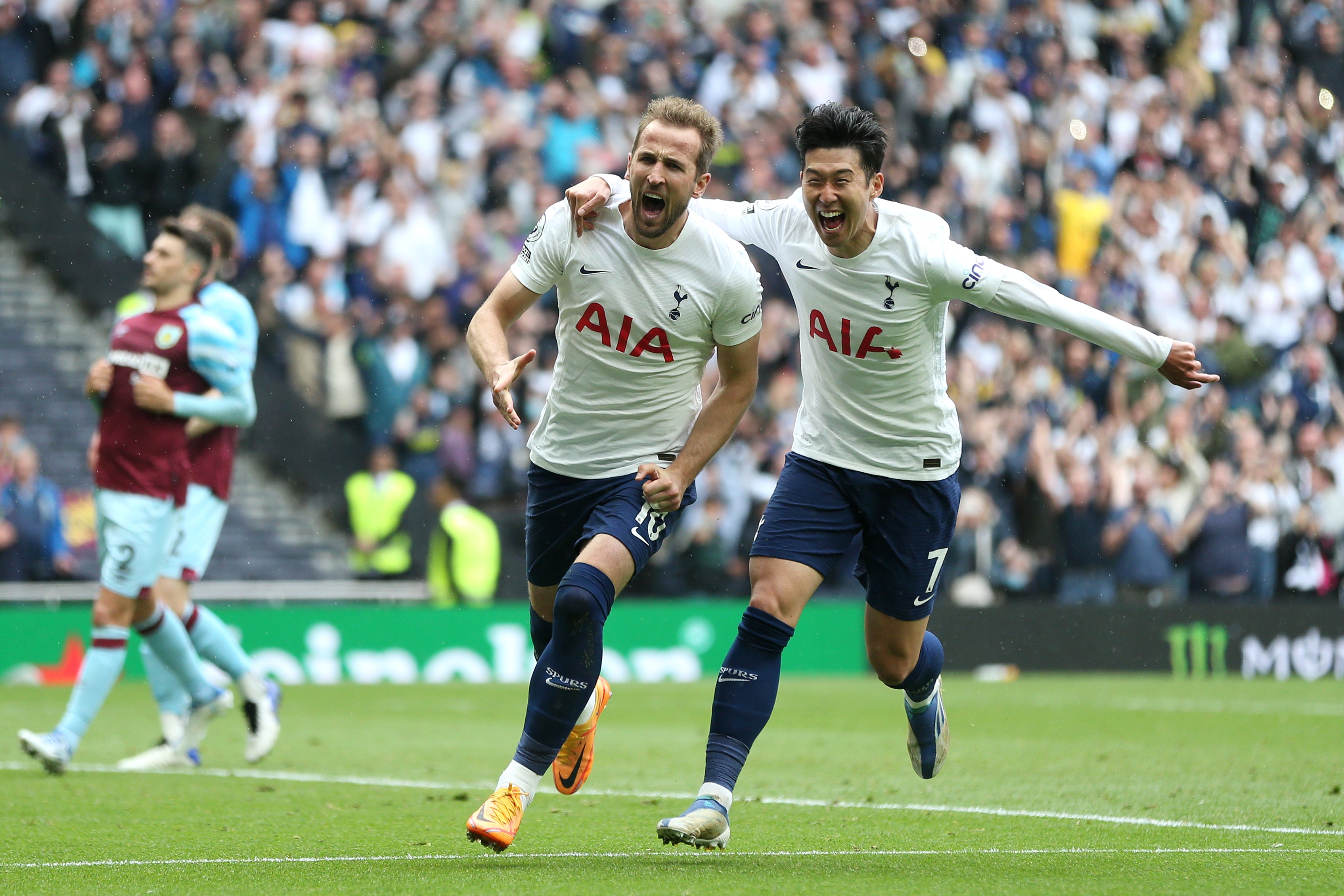 Harry Kane celebrates his clinical penalty with Son Heung-min