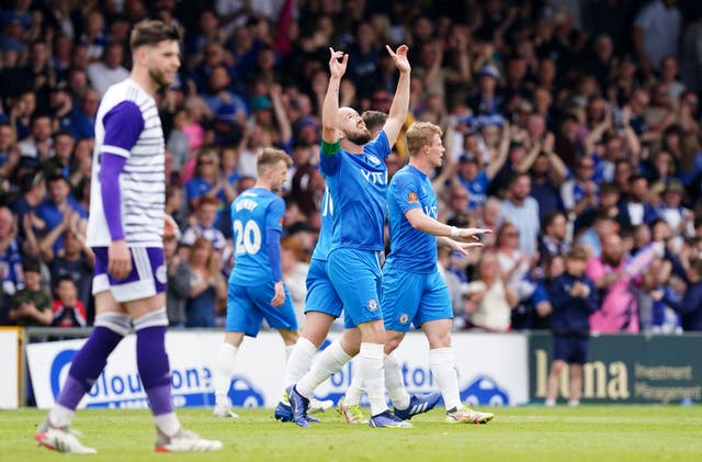 Paddy Madden celebrates scoring in Stockport’s 2-0 win over Halifax (Martin Rickett/PA)