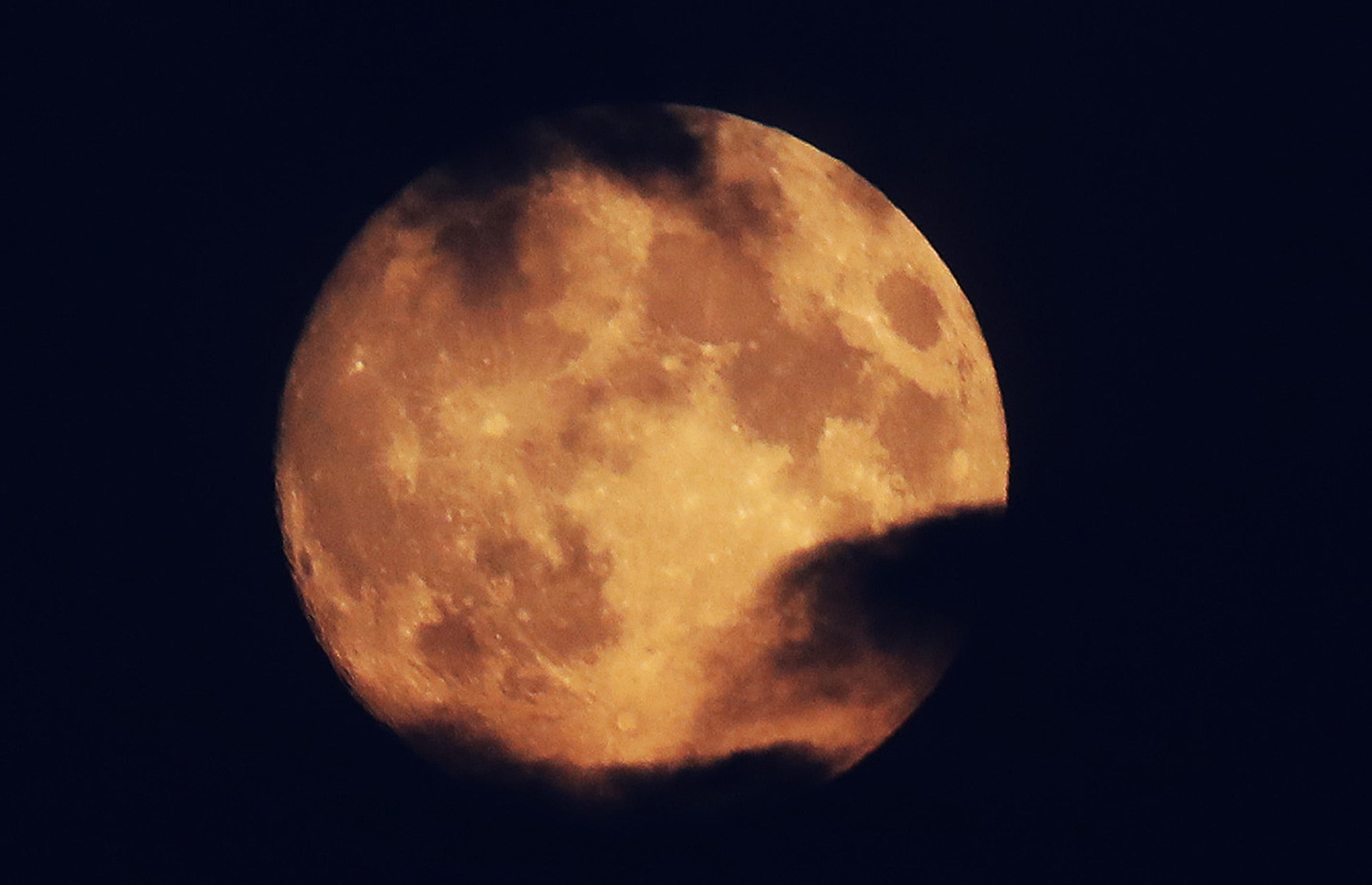 The UK’s only total lunar eclipse of the year is taking place before dawn on Monday (Owen Humphreys/PA)