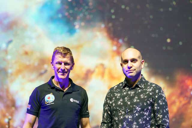 European Space Agency astronaut Tim Peake (left) and Composer Ilan Eshkeri onstage at the Royal Albert Hall (Dominic Lipinski/PA)