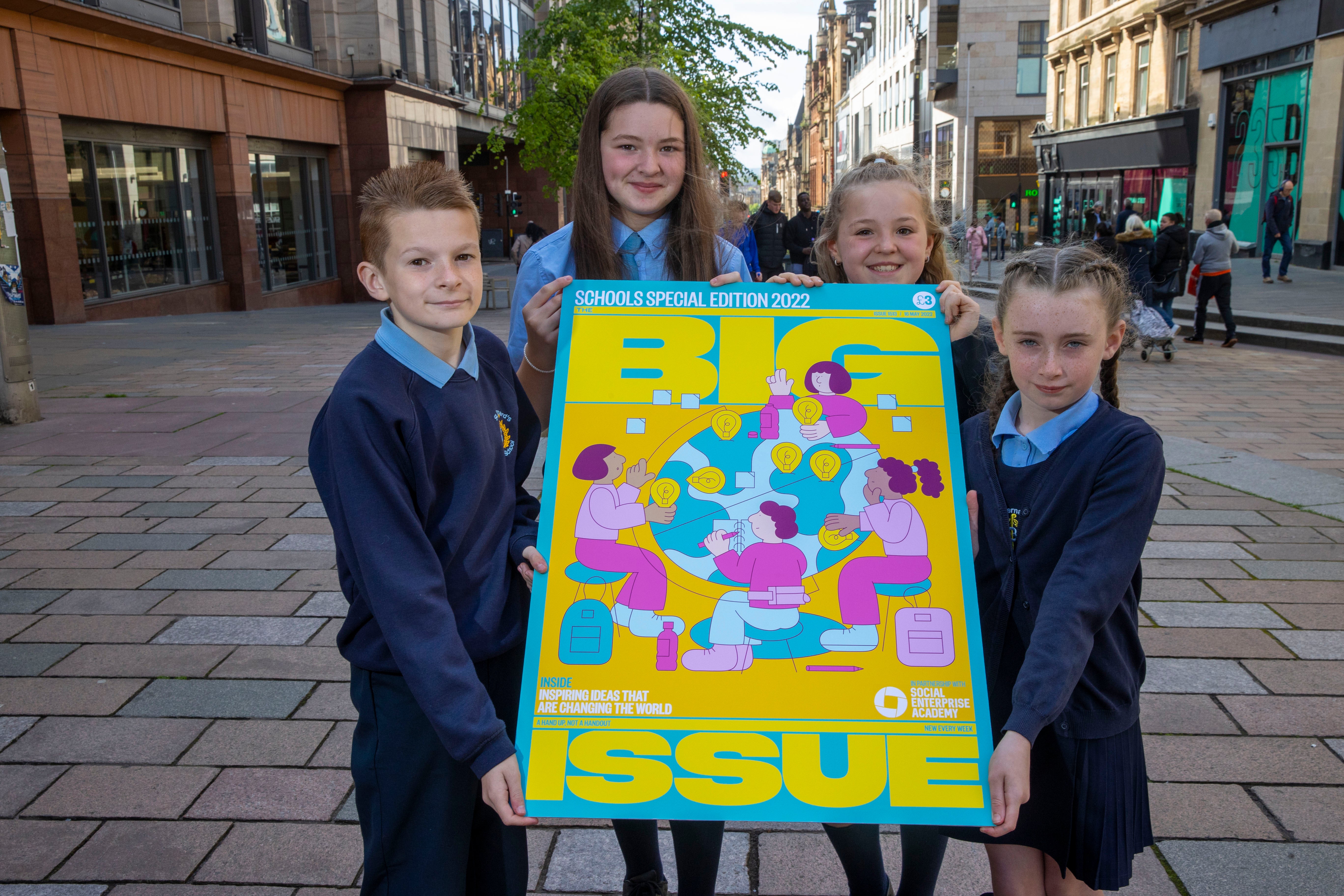 Pupils from St Bernard’s Primary School in Glasgow celebrate their Big issue special edition (Jeff Holmes/Big Issue)