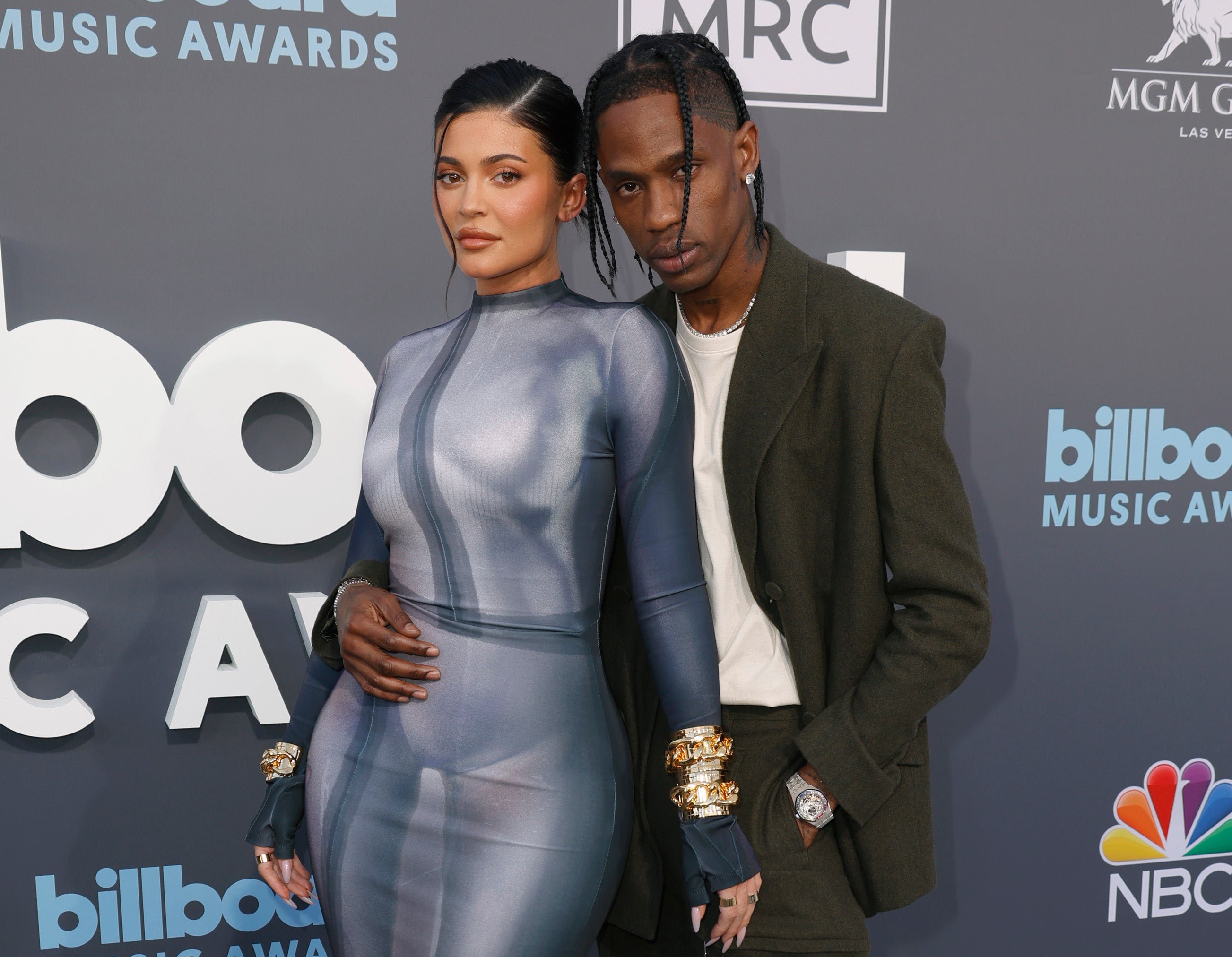 Kylie Jenner, Stormi Webster and Travis Scott pose together on red carpet at Billboard Music Awards