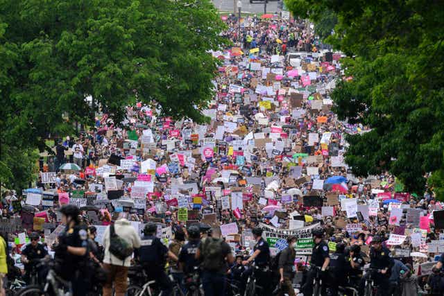 <p>Activists take part in a march for abortion access in Washington DC on 14 May </p>