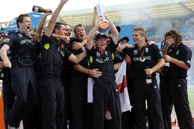 England captain Paul Collingwood (centre) lifts the trophy as they celebrate winning the ICC World Twenty20 final (Rebecca Naden/PA)